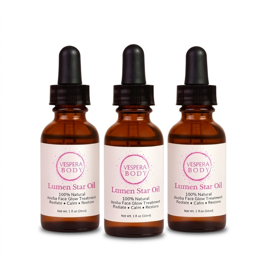Three amber glass bottles of Vespera Body Lumen Star Face Oil. Premium triple-pack botanical glow serum bundle.