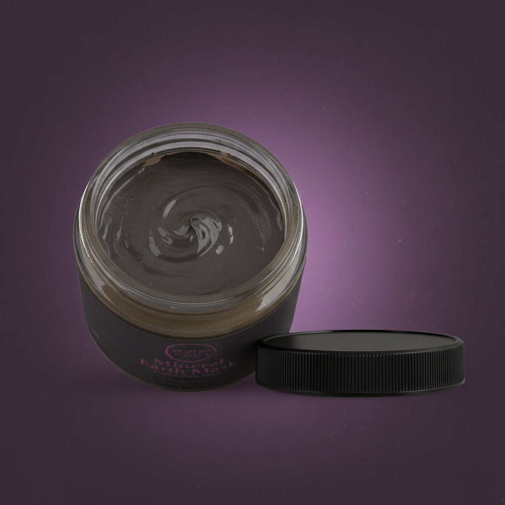 Open jar of Mineral Earth Mask revealing smooth Dead Sea mud texture designed for deep cleansing and mineral replenishment.