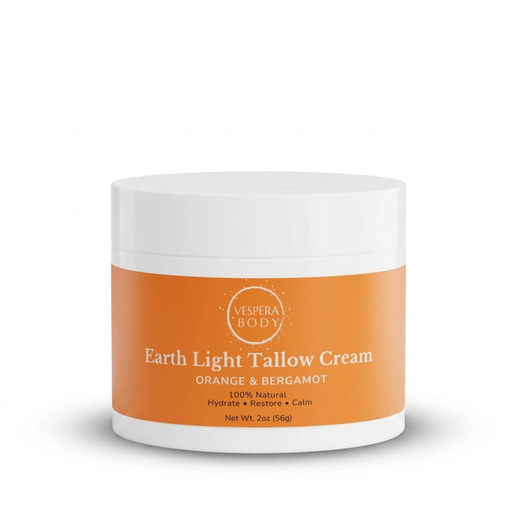 Vespera Body Earth Light Tallow Cream in Orange & Bergamot. A radiant, grass-fed beef tallow moisturizer for glowing skin and anti-aging support, made in the USA.