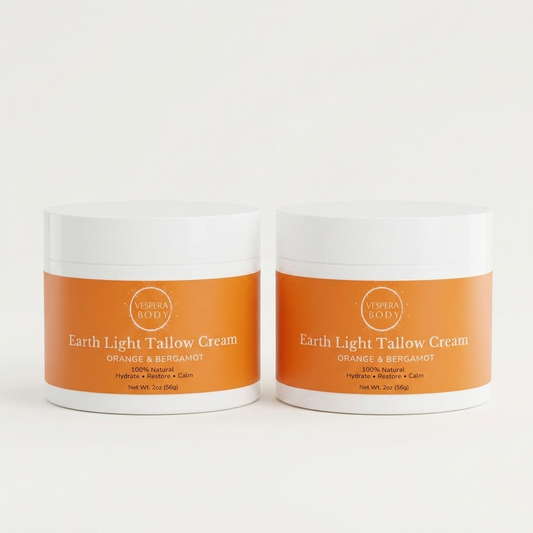  Two jars of Vespera Body grass-fed beef tallow cream moisturizer duo for face and body eczema and dry skin care with orange and bergamot.