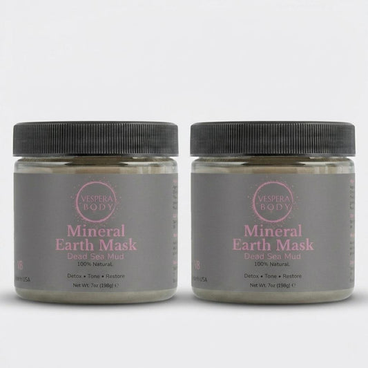 Two jars of Vespera Body 100 percent pure Dead Sea mud mask duo for acne blemish control and large pores extraction.